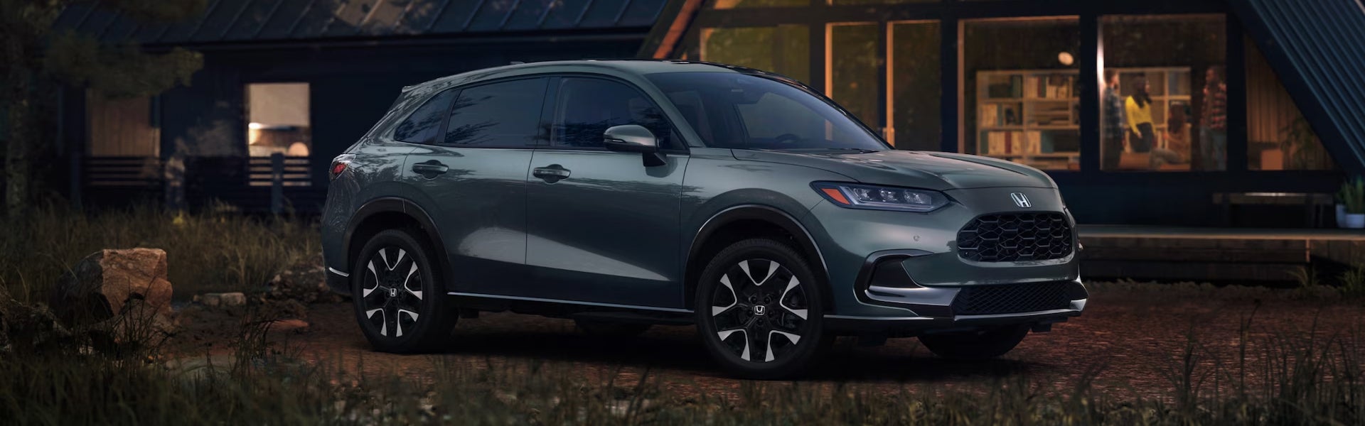 2027 Honda HR-V standing outside the farm house.